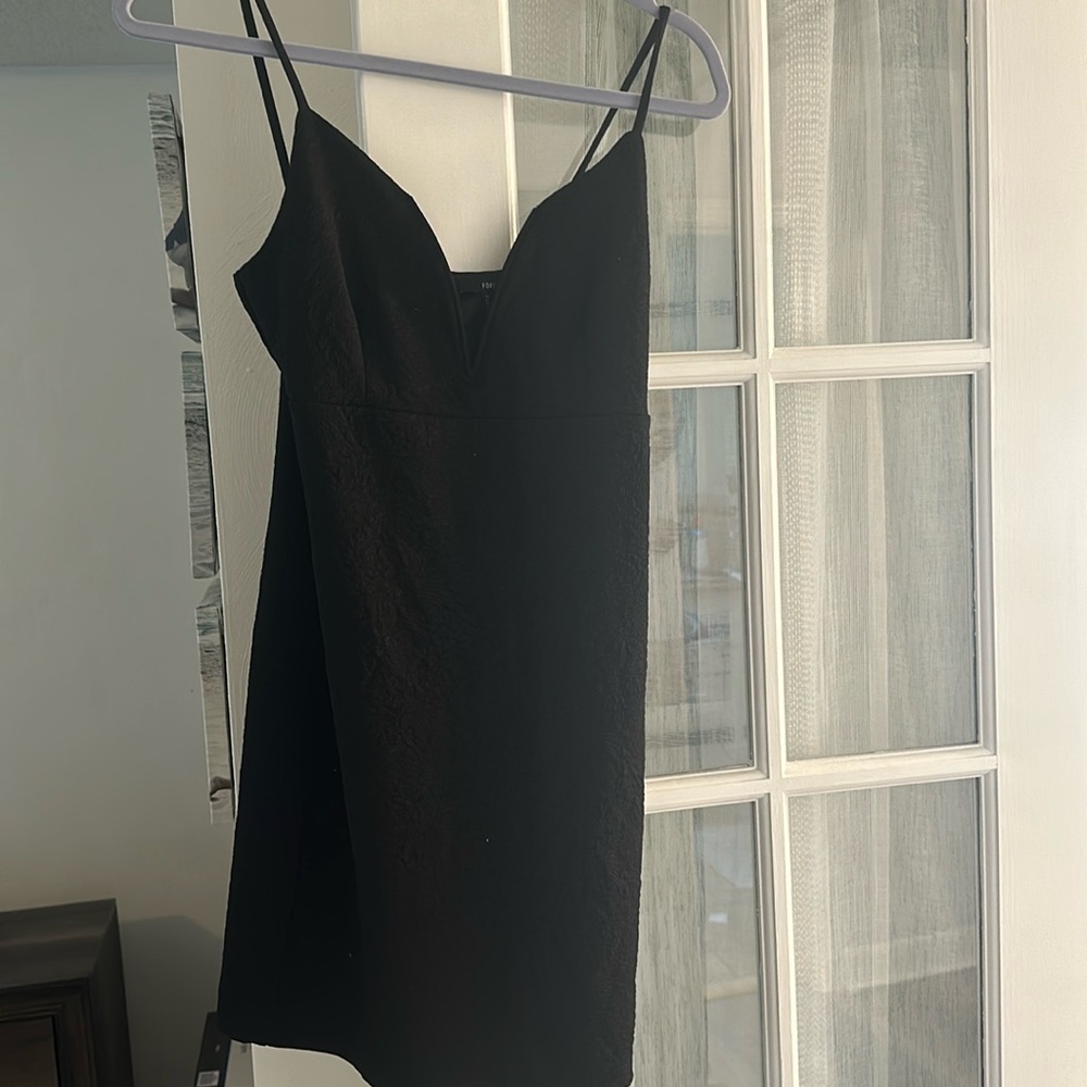 Black mini dress with fine flower detail